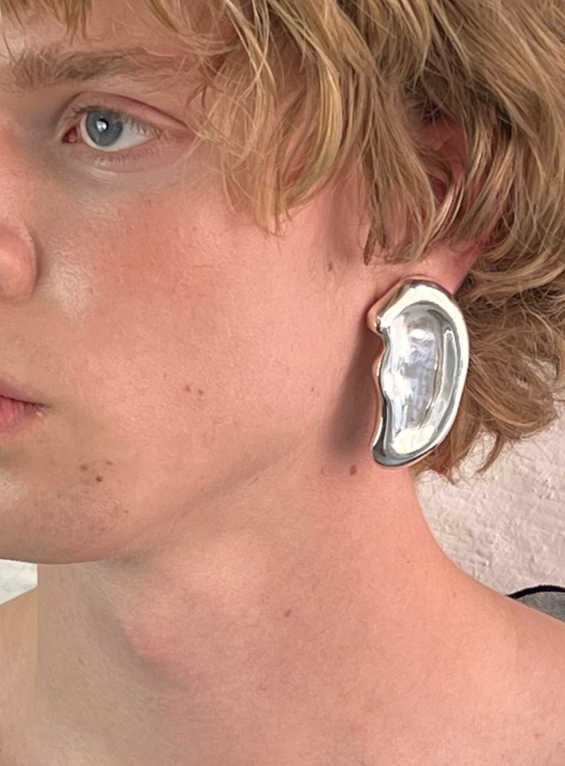 Silver jewelry called Repeating Ear made in Germany